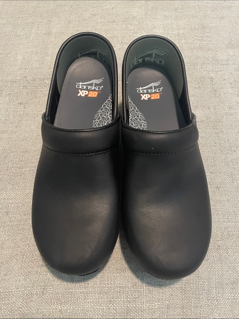 Dansko Black XP 2.0 Slip-On Clogs